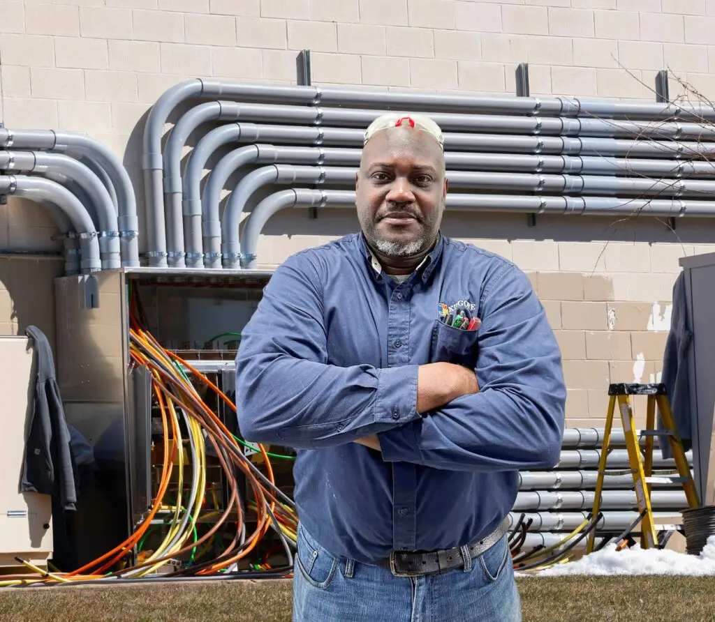 Electrical Technician Working on Electrical System Repair for lighting installation